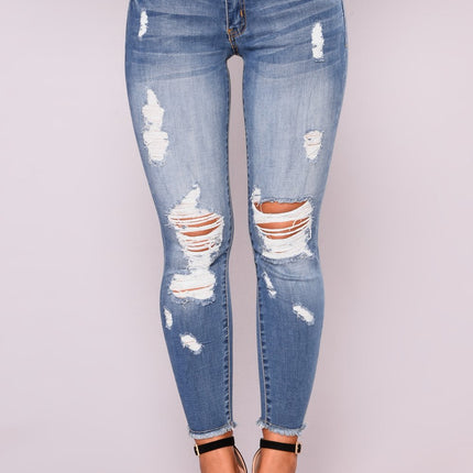 Summer high elasticity 9-point perforated women's clothing, tight fitting and hip lifting fashionable jeans with small feet