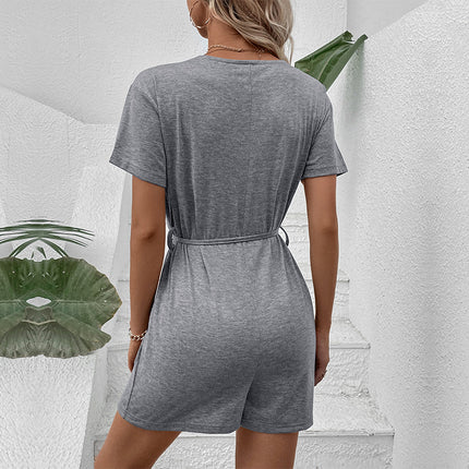 European and American leisure vacation lace up button decoration solid color V-neck jumpsuit