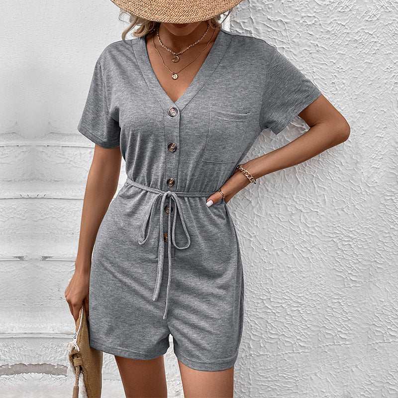 European and American leisure vacation lace up button decoration solid color V-neck jumpsuit